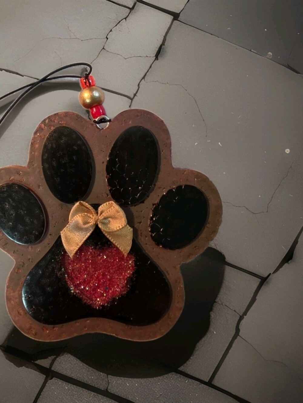 Decorative Paw Pendant with Red Accent and Gold Bow Car Freshie.eucalyptus Scent